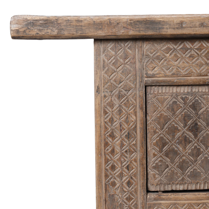 Corner Detail From Carved 19th Century Xinjiang Low Sideboard Converted From Daybed With Geometric And Floral Carved Panels And Iron Ring Pulls | Indigo Antiques