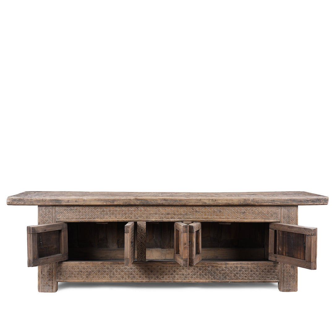 Open Doors Detail From Carved 19th Century Xinjiang Low Sideboard Converted From Daybed With Geometric And Floral Carved Panels And Iron Ring Pulls | Indigo Antiques