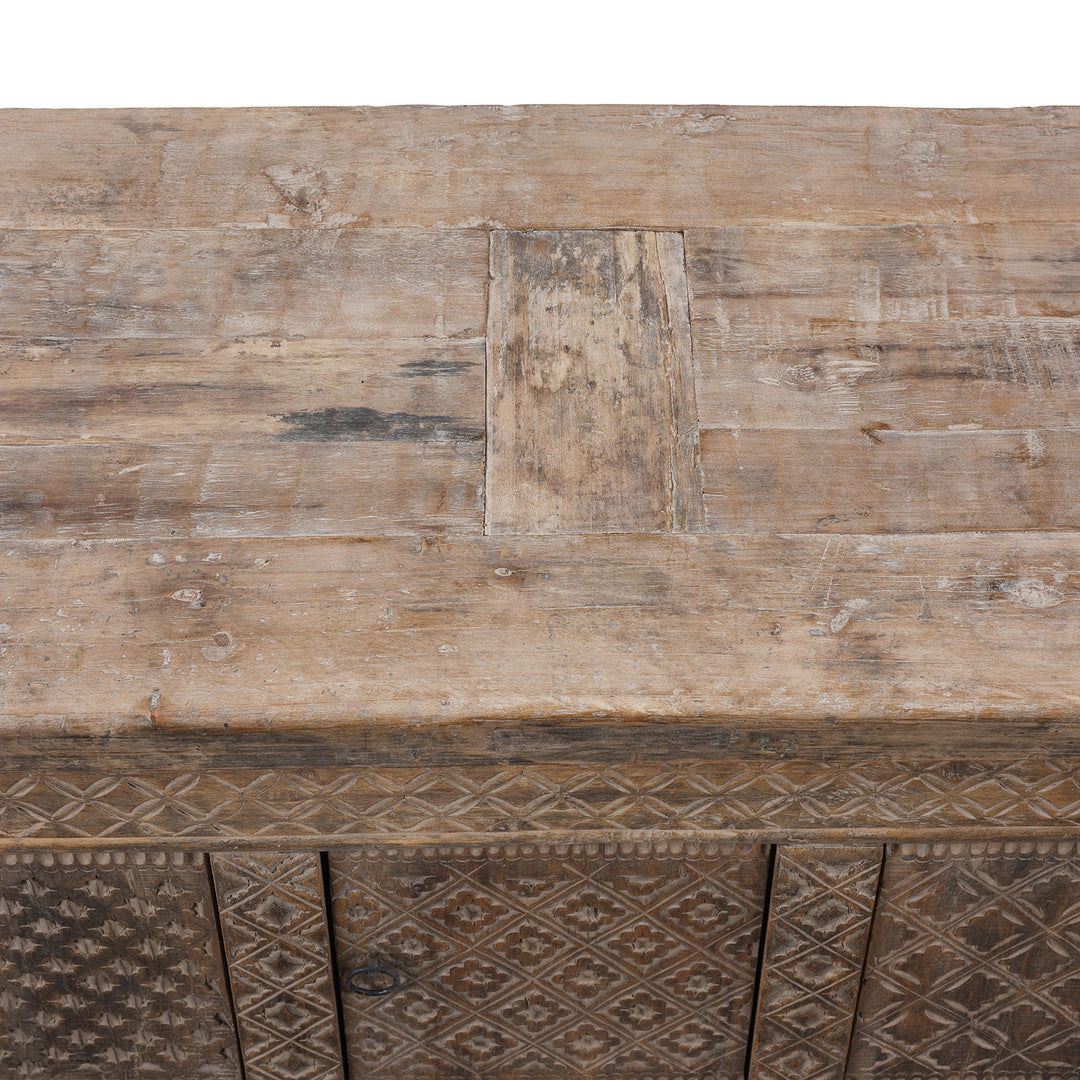 Top Detail From Carved 19th Century Xinjiang Low Sideboard Converted From Daybed With Geometric And Floral Carved Panels And Iron Ring Pulls | Indigo Antiques