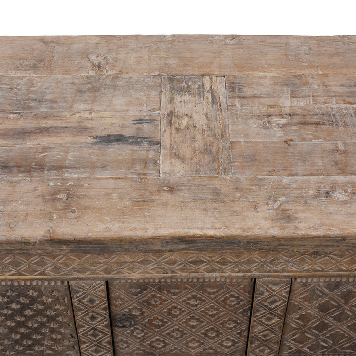 Top Detail From Carved 19th Century Xinjiang Low Sideboard Converted From Daybed With Geometric And Floral Carved Panels And Iron Ring Pulls | Indigo Antiques
