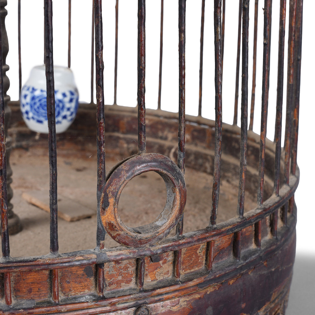 Entrance Detail From Old Chinese Bamboo Bird Cage With Rounded Entrance Hole Carved Wooden Stand And Porcelain Feeding Bowl