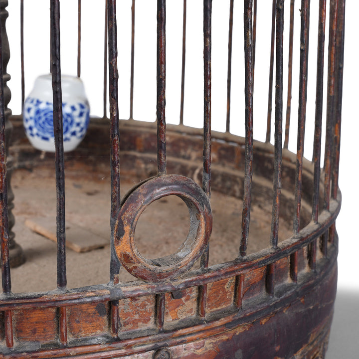 Entrance Detail From Old Chinese Bamboo Bird Cage With Rounded Entrance Hole Carved Wooden Stand And Porcelain Feeding Bowl