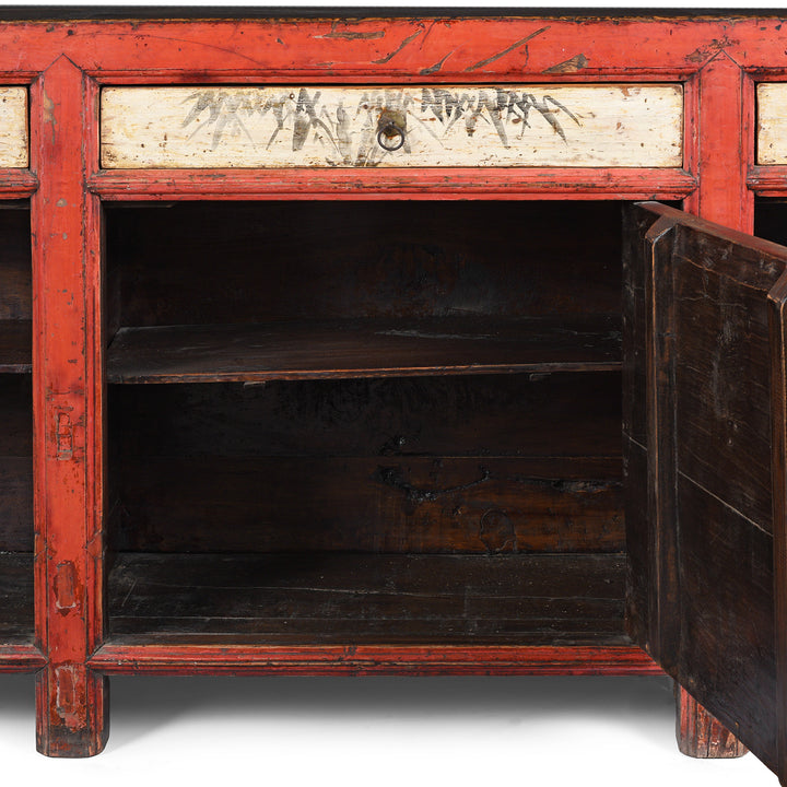 Interior Of Cupboard From Antique Chinese Red Lacquer Sideboard With Hand-Painted Landscape Panels And Three Drawers