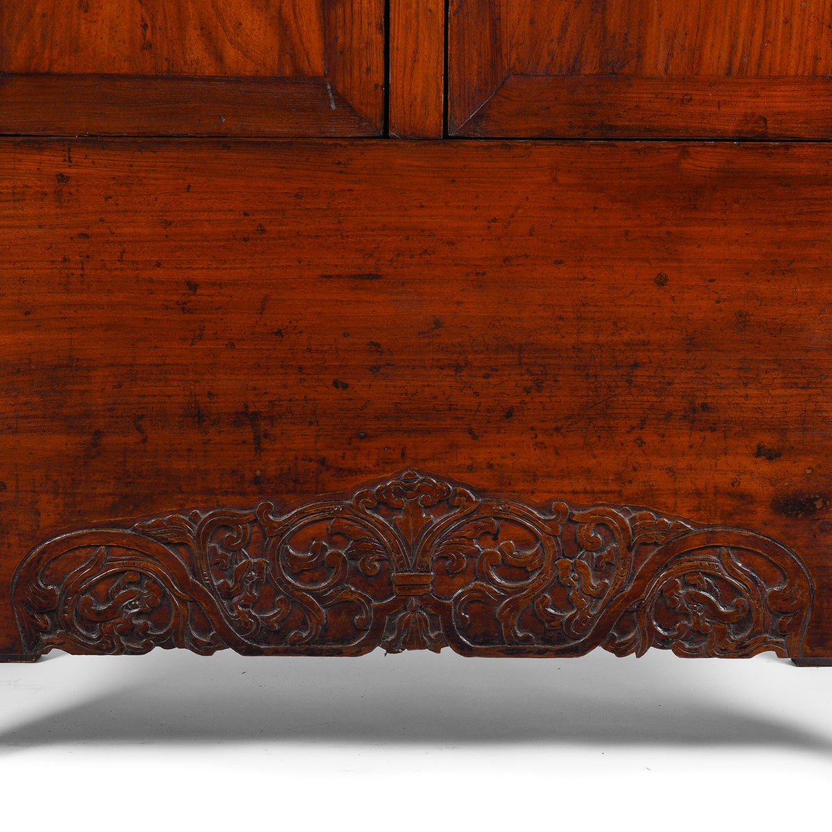 Carving Detail From Antique Chinese Elm Compound Cabinet With Brass Fittings And Carved Lower Panel