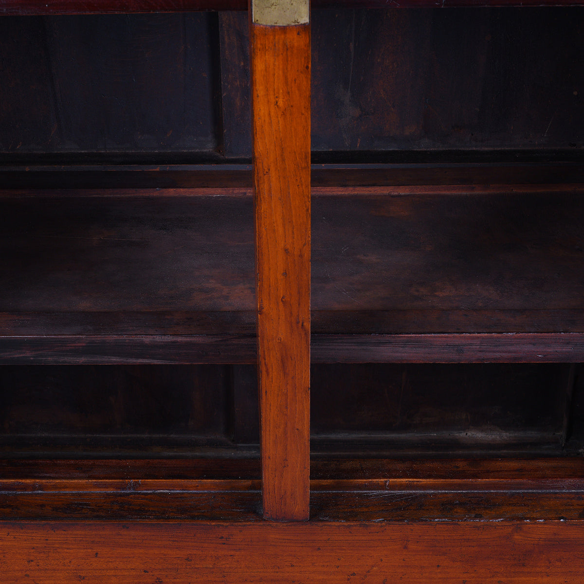 Interior Of Antique Chinese Elm Compound Cabinet With Brass Fittings And Carved Lower Panel