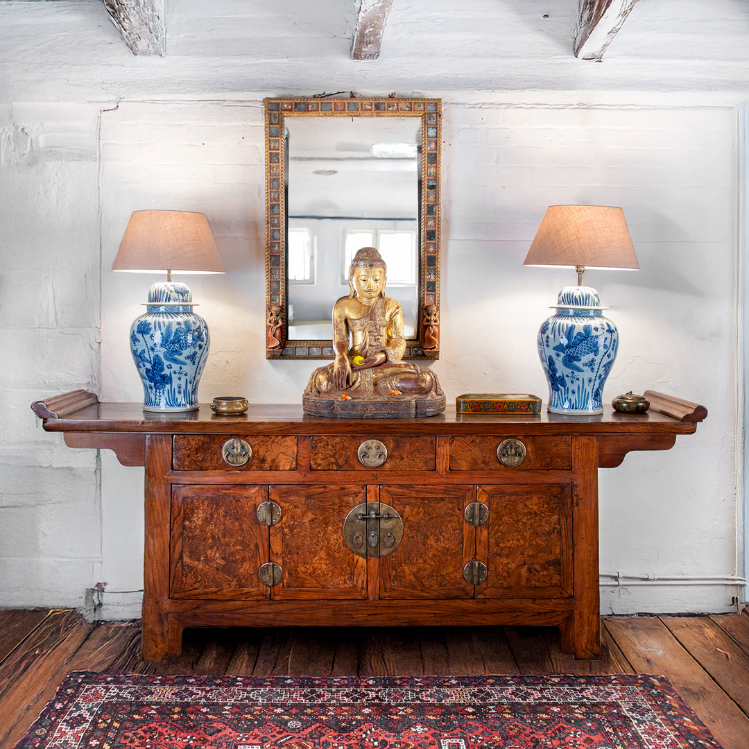 Antique Chinese Burr elm sideboard with blue & white porcelain jar lamps & a Mandalay antique Buddha