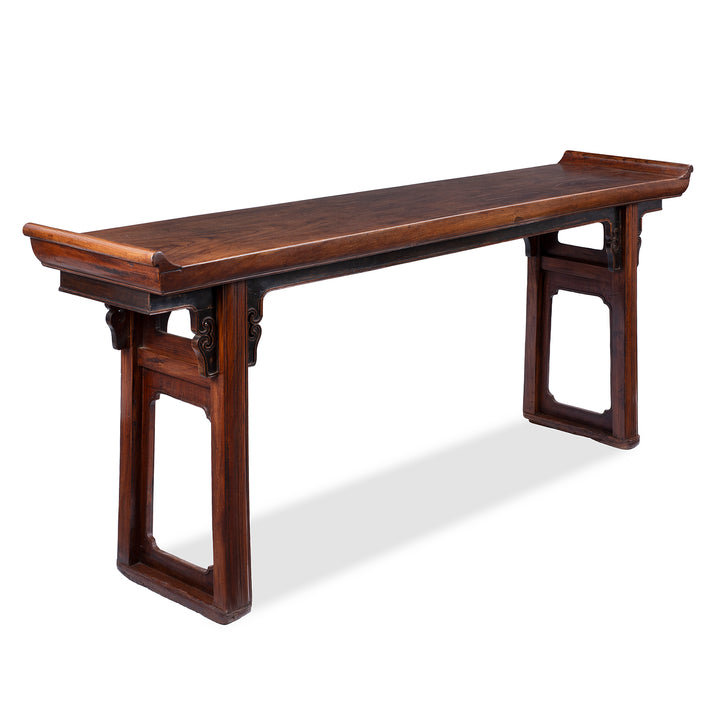 Angled View Of Antique Chinese Red Elm Altar Table From Suzhou With Scroll Ends And Carved Spandrels 18th Century