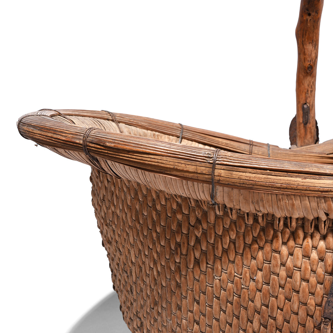 Weaving Detail From Vintage Chinese Woven Willow Basket With Wooden Handle And Metal Reinforcements