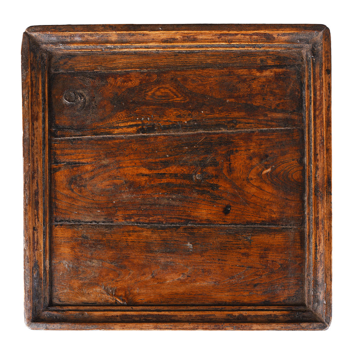 Top Down View Of Light Vintage Square Wooden Tea Tray With Raised Edge And Rich Patina