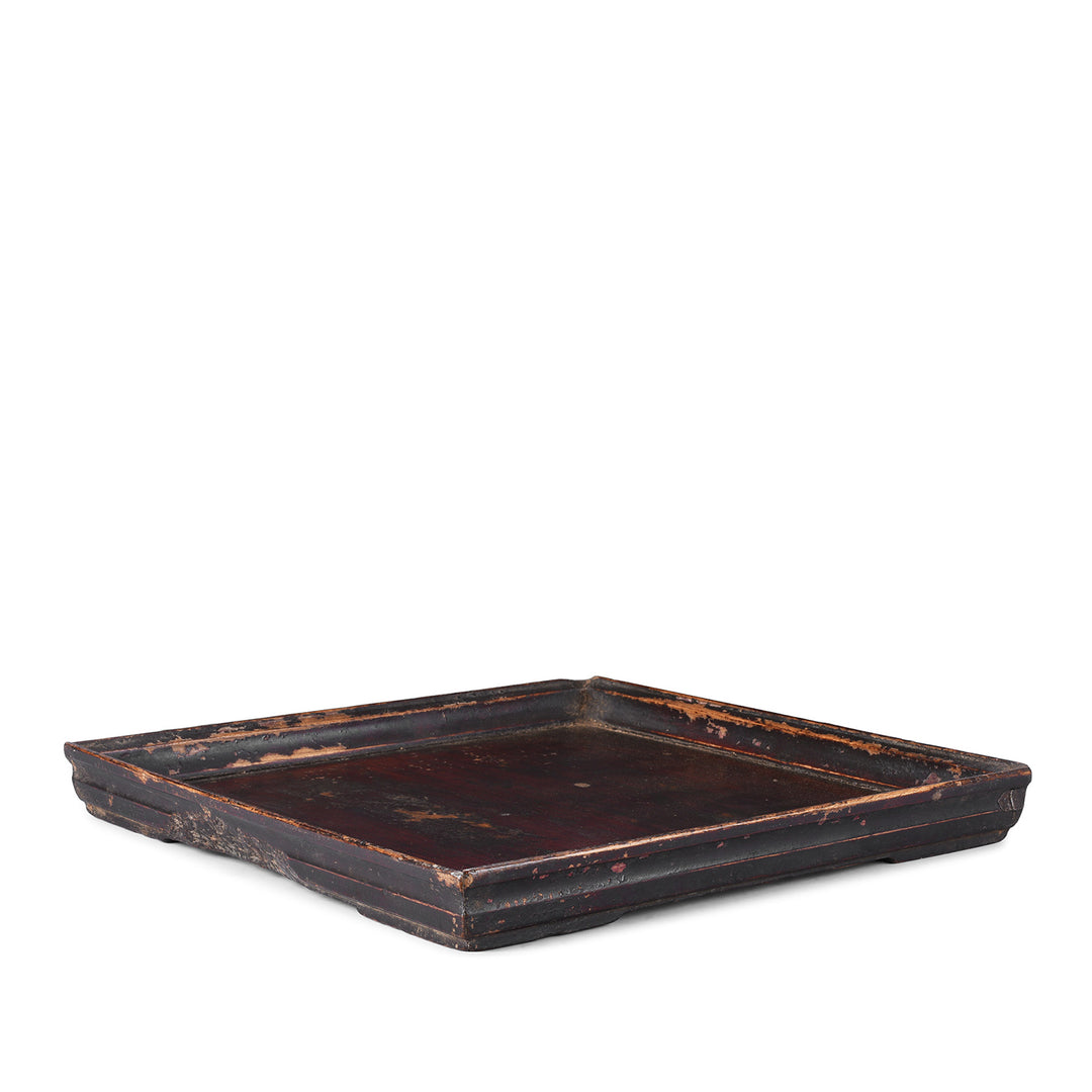 Angled VIew Of Dark Vintage Square Wooden Tea Tray With Raised Edge And Rich Patina