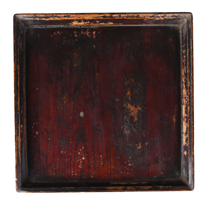 Top Down View Of Dark Vintage Square Wooden Tea Tray With Raised Edge And Rich Patina