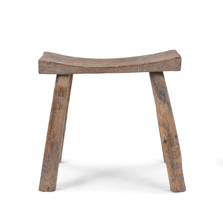 Rustic 19th Century Elm Saddle Stool With Hand Shaped Seat And Stretcher Supports Showing Natural Patina And Age Wear | Indigo Antiques