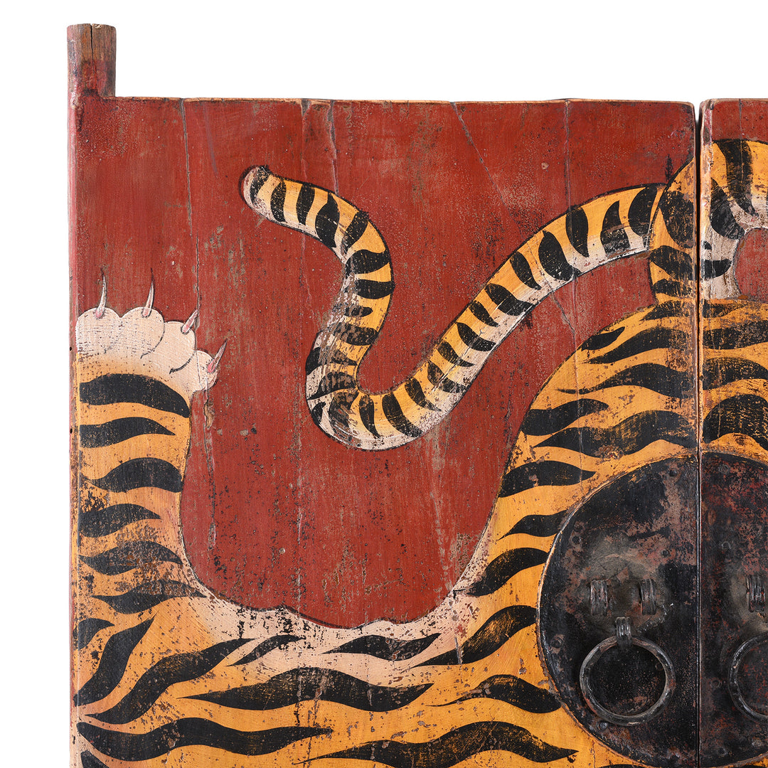 Top Crner Lug Detail From Hand Painted Reproduction Qinghai Tiger Doors With Stylised Striped Motif On Distressed Red Background