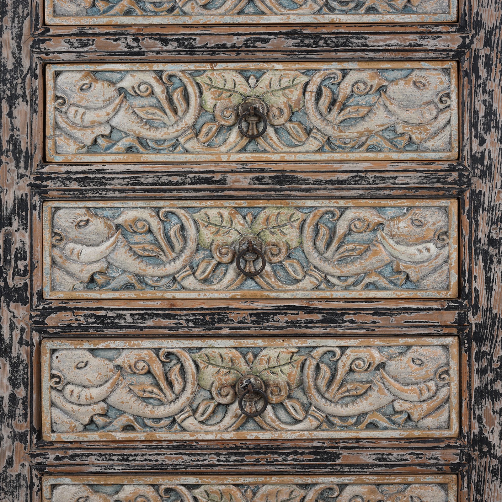 Drawer Detail Of Elephant Carvings From Hand-Carved Indian Chest Of Drawers With Floral Motifs And Distressed Painted Finish