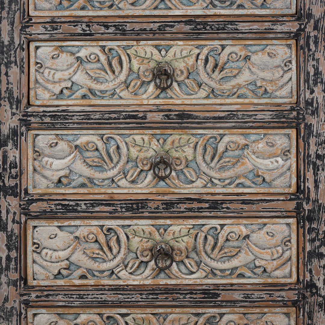 Drawer Detail Of Elephant Carvings From Hand-Carved Indian Chest Of Drawers With Floral Motifs And Distressed Painted Finish