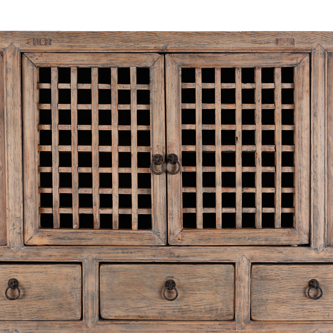 Rustic Wooden cabinet with lattice doors and visible hardware on a white background