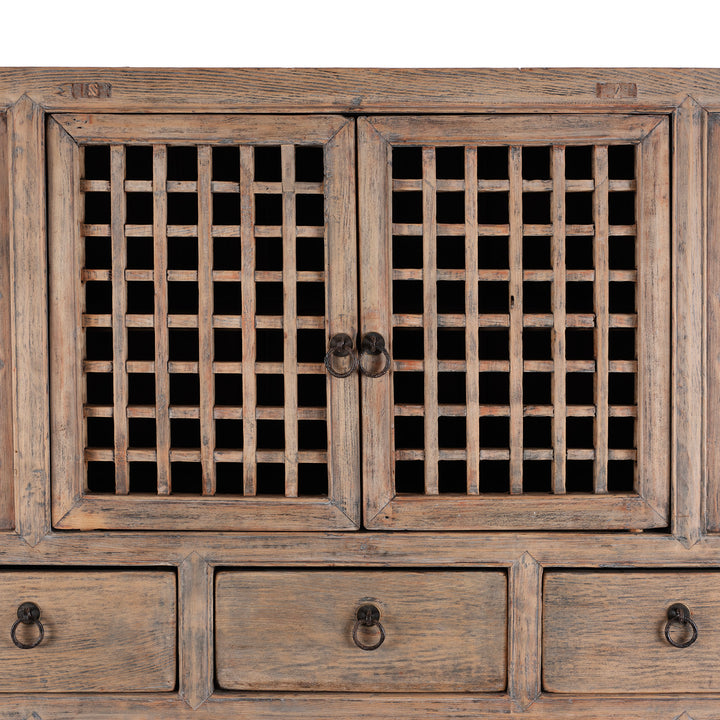Rustic Wooden cabinet with lattice doors and visible hardware on a white background