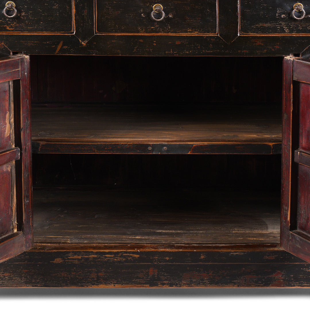 Internal View Of Shelving From Antique Chinese Black Lacquered Cabinet With Upper Lattice Doors And Lower Panelled Cupboard And Drawer Section