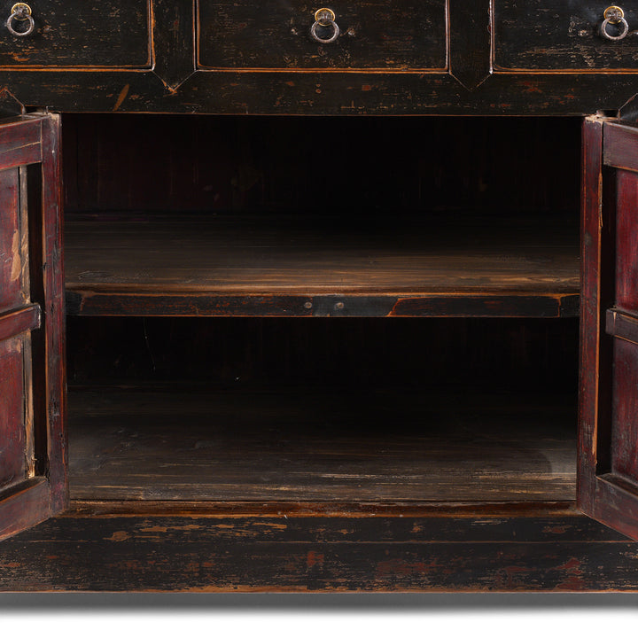 Internal View Of Shelving From Antique Chinese Black Lacquered Cabinet With Upper Lattice Doors And Lower Panelled Cupboard And Drawer Section