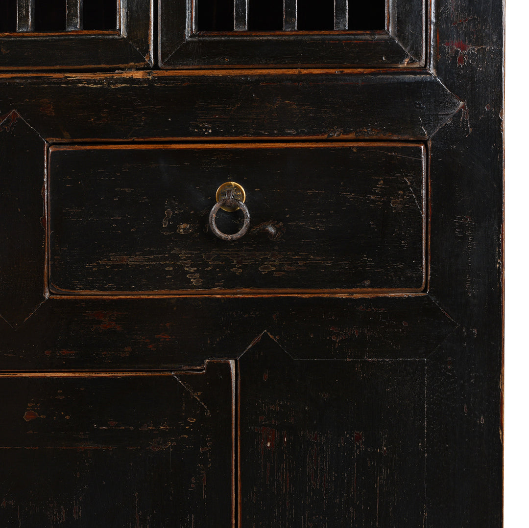 Detailed View Of Lacquer Work From Antique Chinese Black Lacquered Cabinet With Upper Lattice Doors And Lower Panelled Cupboard And Drawer Section