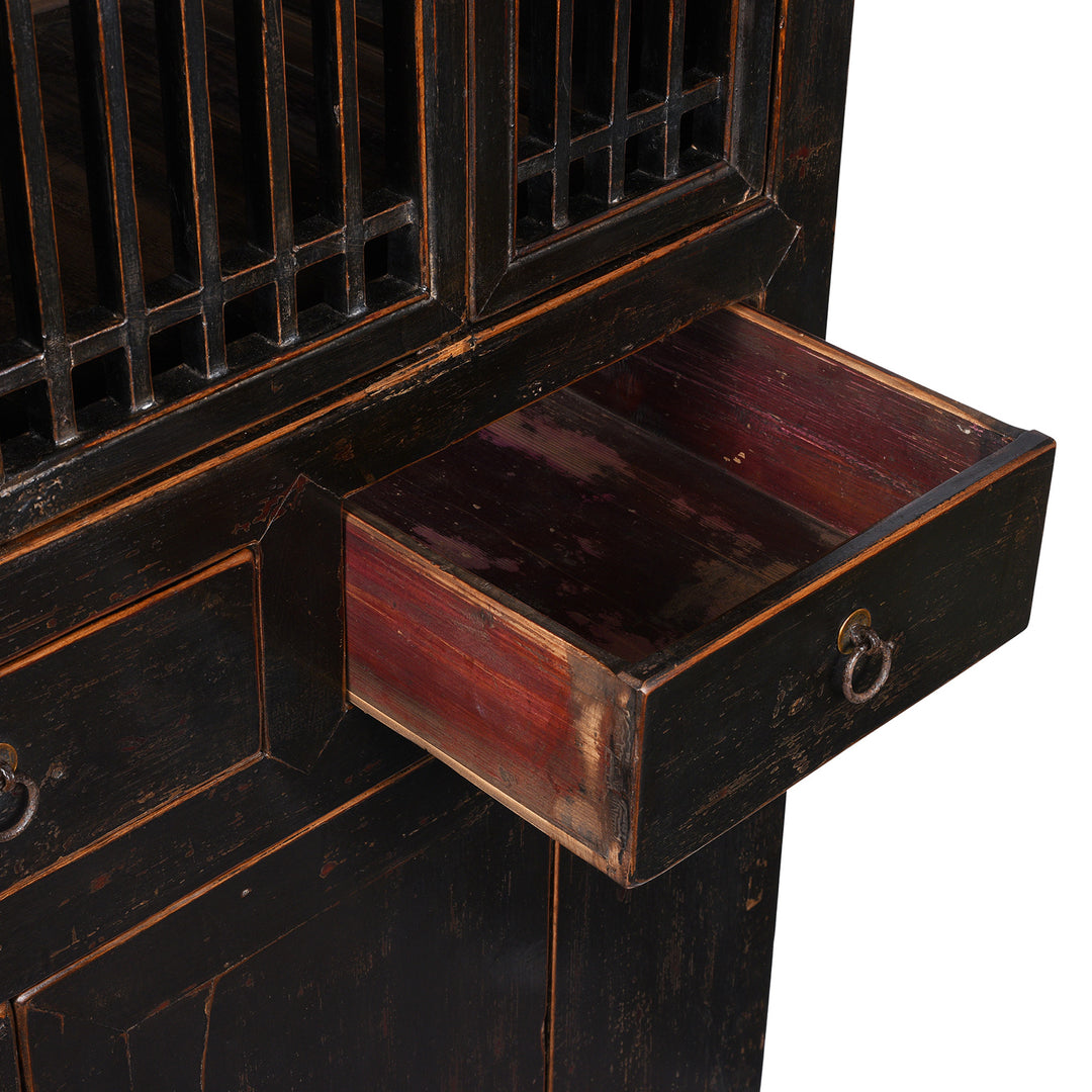 Detail View Of Drawer From Antique Chinese Black Lacquered Cabinet With Upper Lattice Doors And Lower Panelled Cupboard And Drawer Section