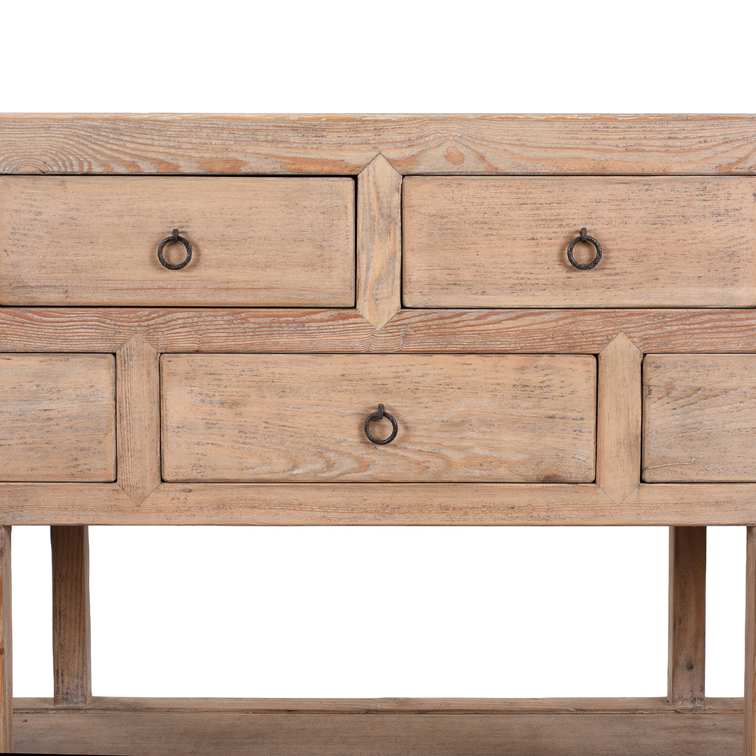 Detail From Centre Of Long Chinese Console Table With Eleven Drawers And Open Shelf Made From Lightly Weathered Old Pine Wood