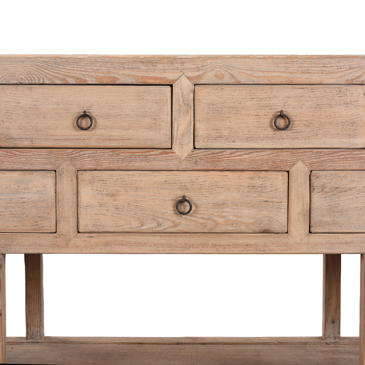 Detail From Centre Of Long Chinese Console Table With Eleven Drawers And Open Shelf Made From Lightly Weathered Old Pine Wood