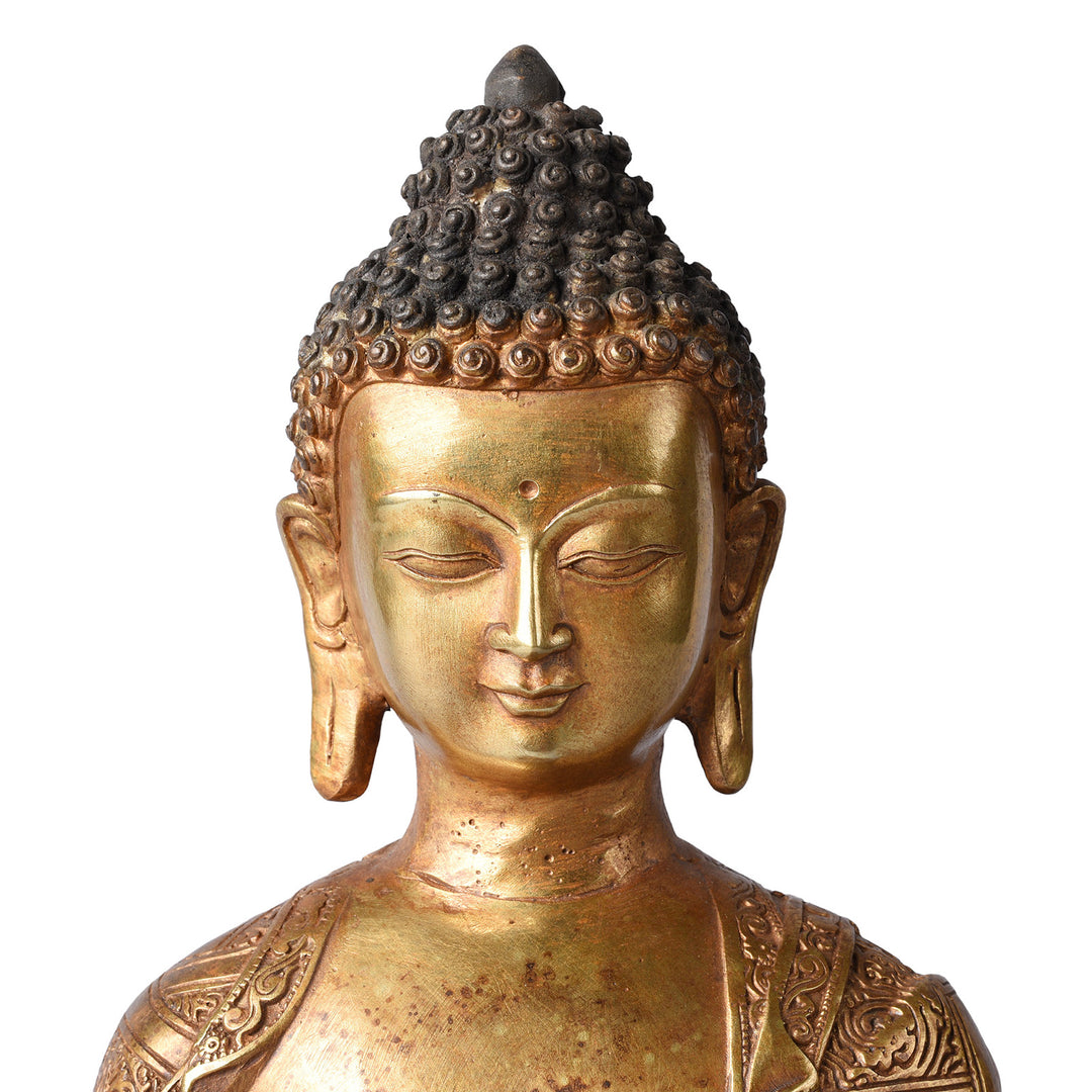 Face Detail From Gilt Brass Buddha - Varada Mudra | Indigo Antiques
