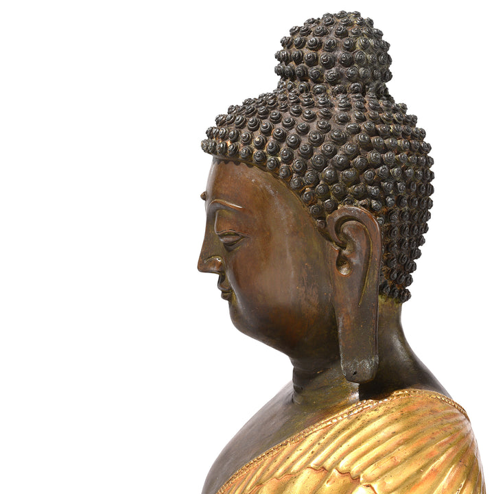 Profile View Of Gilt Bronze Sitting Buddha Statue - Varada Mudra | Indigo Antiques