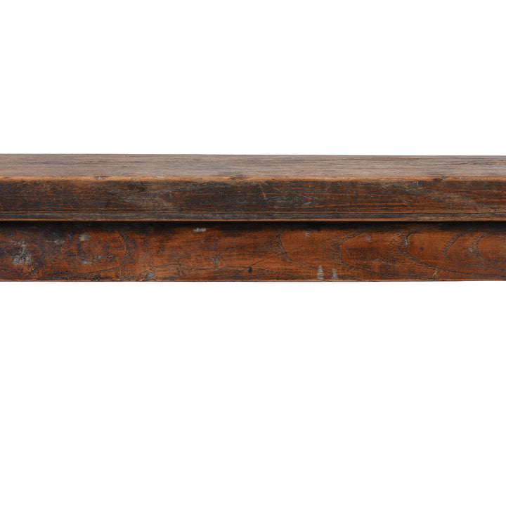 Detail From 19th century Chinese rustic solid walnut farm bench with thick plank top, trestle legs, original patina and traces of historic dark lacquer | Indigo Antiques