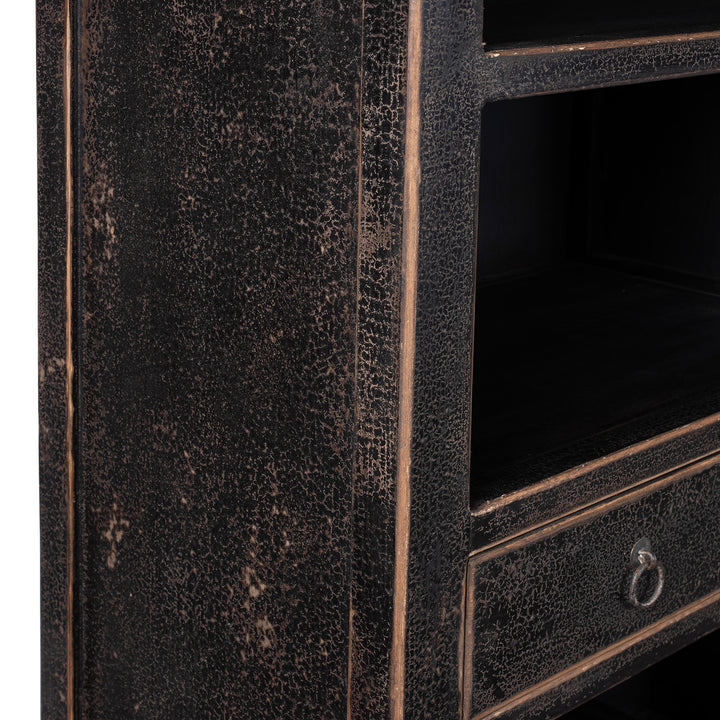 Crackling Detail From Tall Black Distressed Pine Shelf Unit With Geometric Open Compartments And Drawers