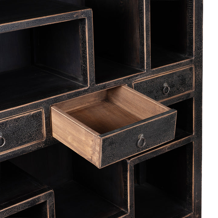 Drawer Interior Detail From Tall Black Distressed Pine Shelf Unit With Geometric Open Compartments And Drawers