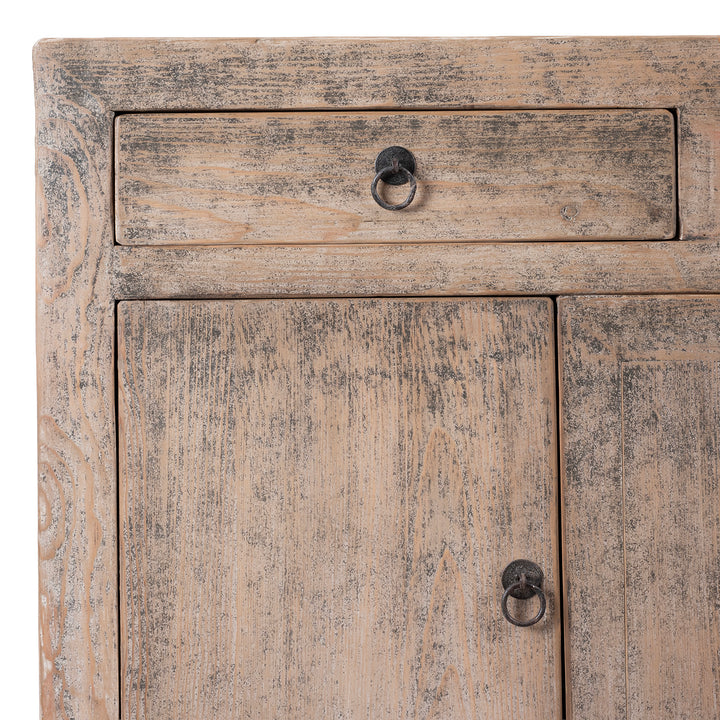 Wooden cabinet with a single drawer and two doors, featuring rustic design and metal handles.