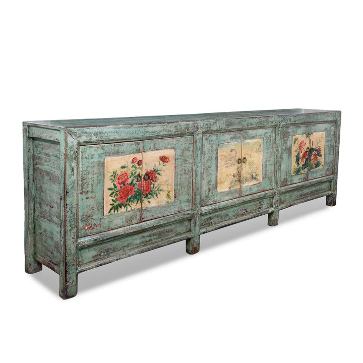 Angled VIew Of Vintage Mint Painted Shanxi Sideboard With Floral And Landscape Painted Panels And Long Low Form