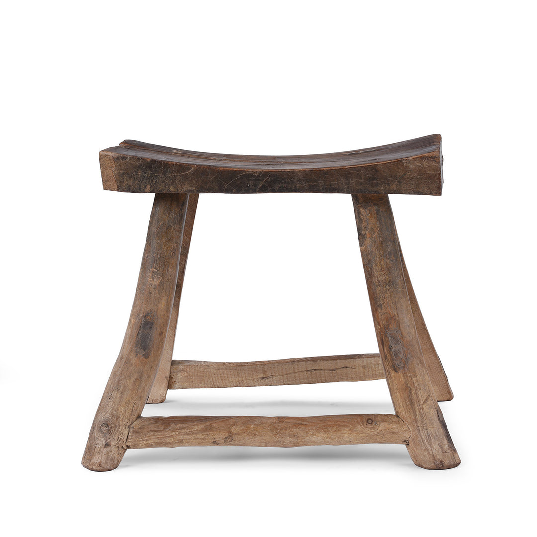 Rustic 19th Century Elm Saddle Stool With Hand Shaped Seat And Stretcher Supports Showing Natural Patina And Age Wear