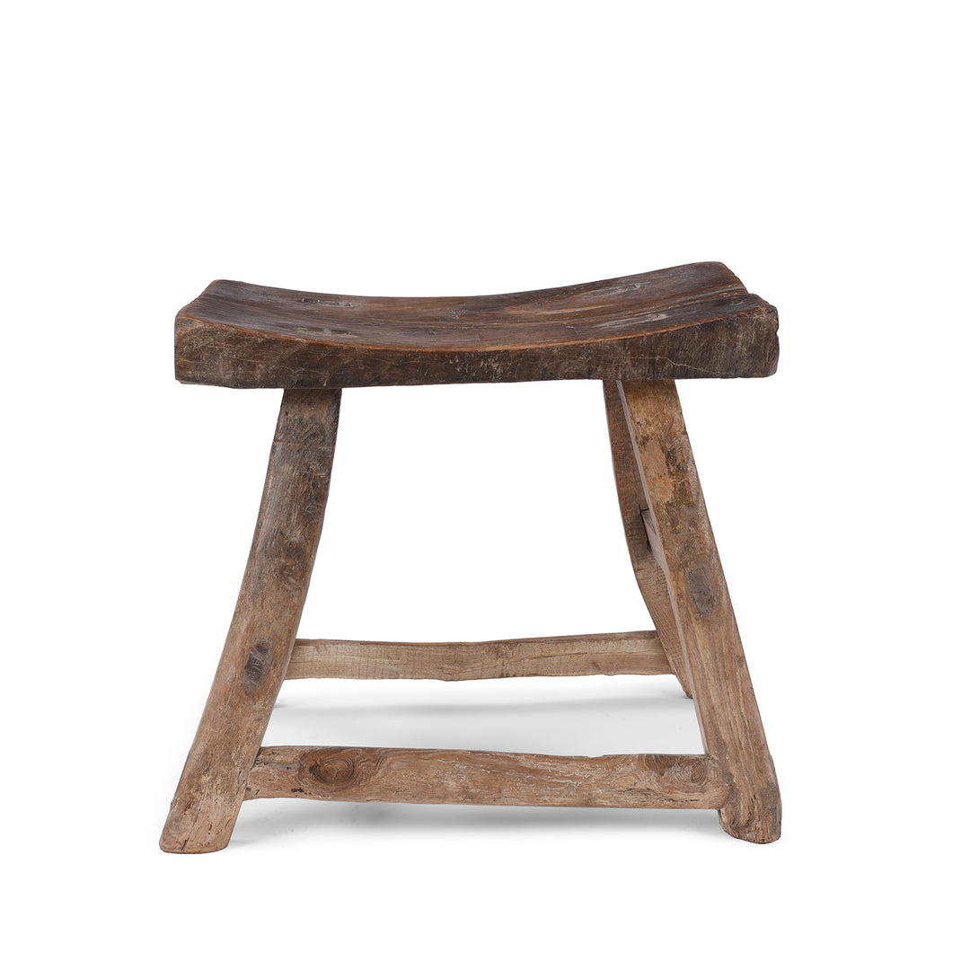 Rustic 19th Century Elm Saddle Stool With Hand Shaped Seat And Stretcher Supports Showing Natural Patina And Age Wear