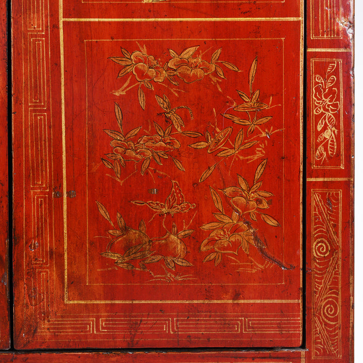 Door Detail From Antique Chinese Dongbei Sideboard With Red Lacquer Finish And Hand-Painted Gilded Landscape Motifs