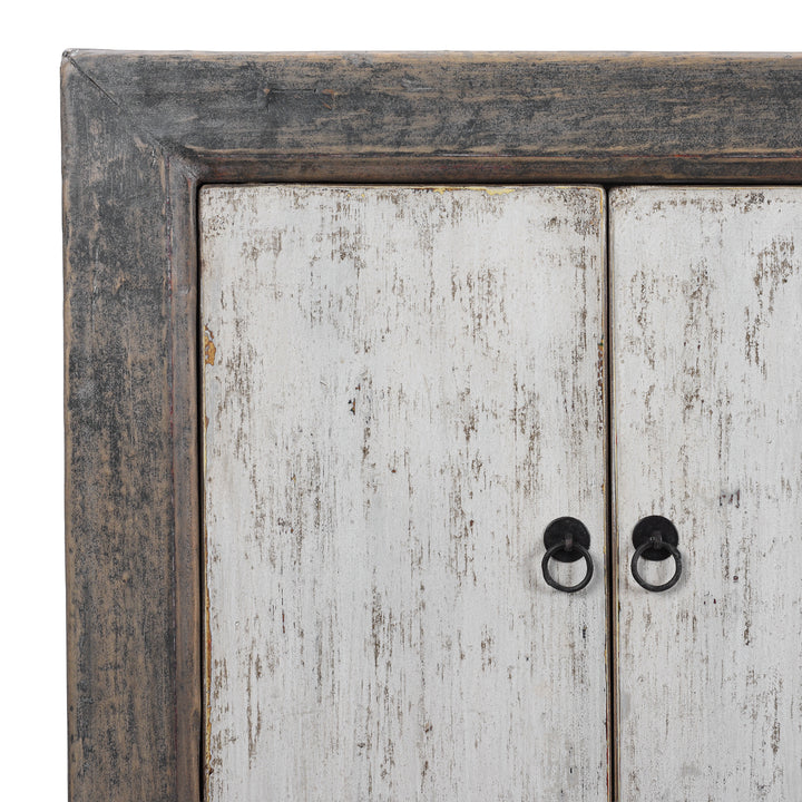 Corner View Of Long Rustic Mongolian Sideboard Made From Reclaimed Wood With Distressed Black And White Painted Doors