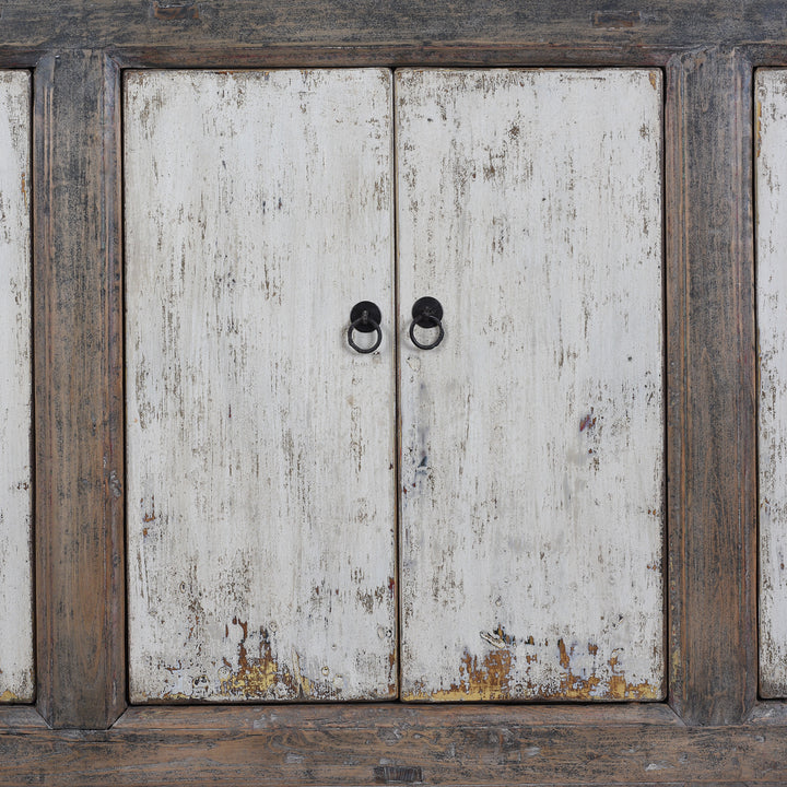 Detailed View Of Patina On Long Rustic Mongolian Sideboard Made From Reclaimed Wood With Distressed Black And White Painted Doors