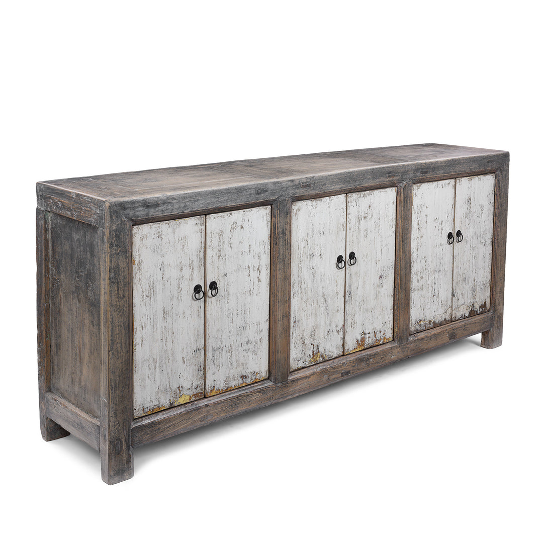 Angled View Of Long Rustic Mongolian Sideboard Made From Reclaimed Wood With Distressed Black And White Painted Doors