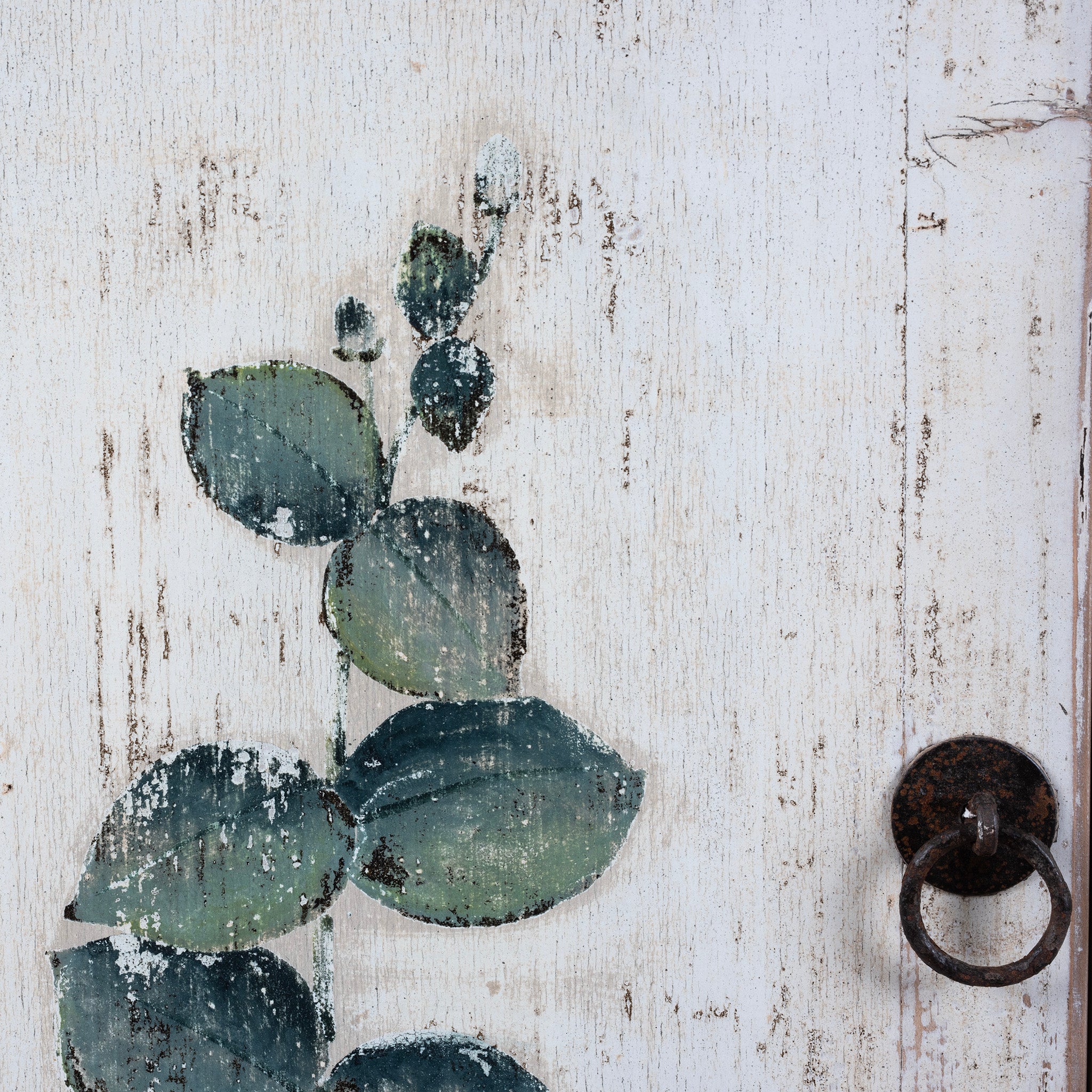 Detailed View Of Iron Handles From Distressed White Chinese Side Cabinet With Hand Painted Botanical Motifs On Double Doors