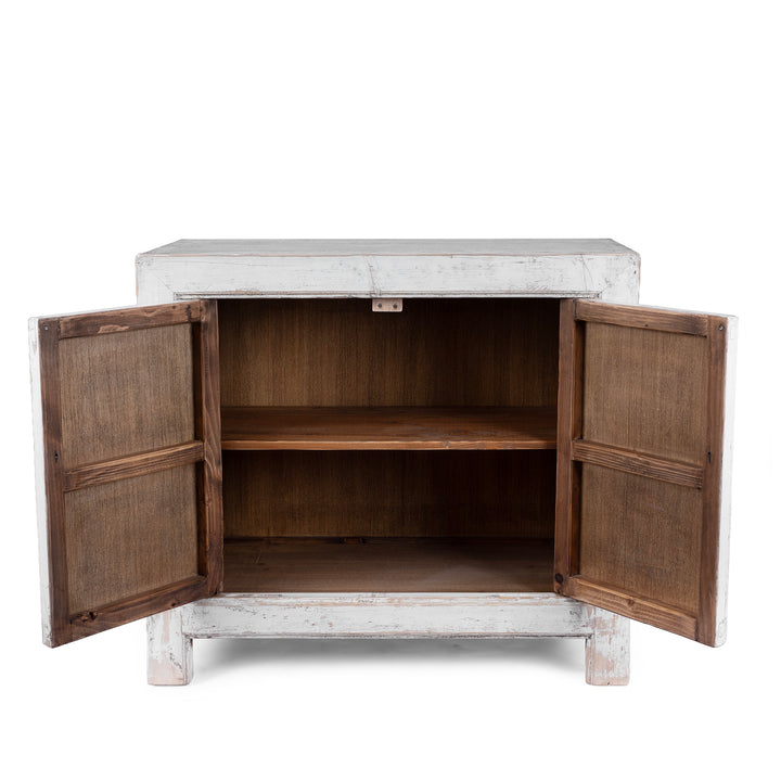 Interior View Of Distressed White Chinese Side Cabinet With Hand Painted Botanical Motifs On Double Doors