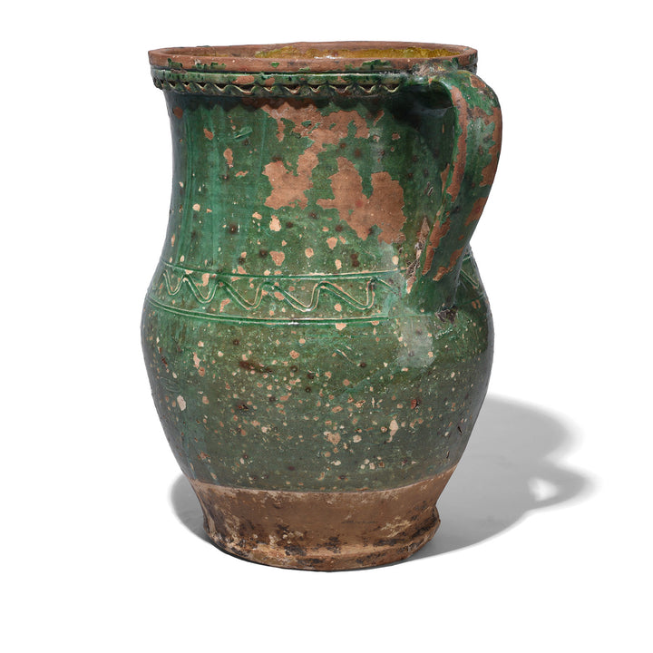 Angled VIew Of Distressed Green Sancai Glazed Terracotta Vase With Twin Handles From Yunnan Province China | Indigo Antiques