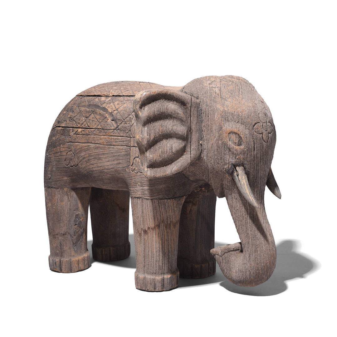 Carved Teak Gujarati Elephant With Floral Motif And Incised Decoration
