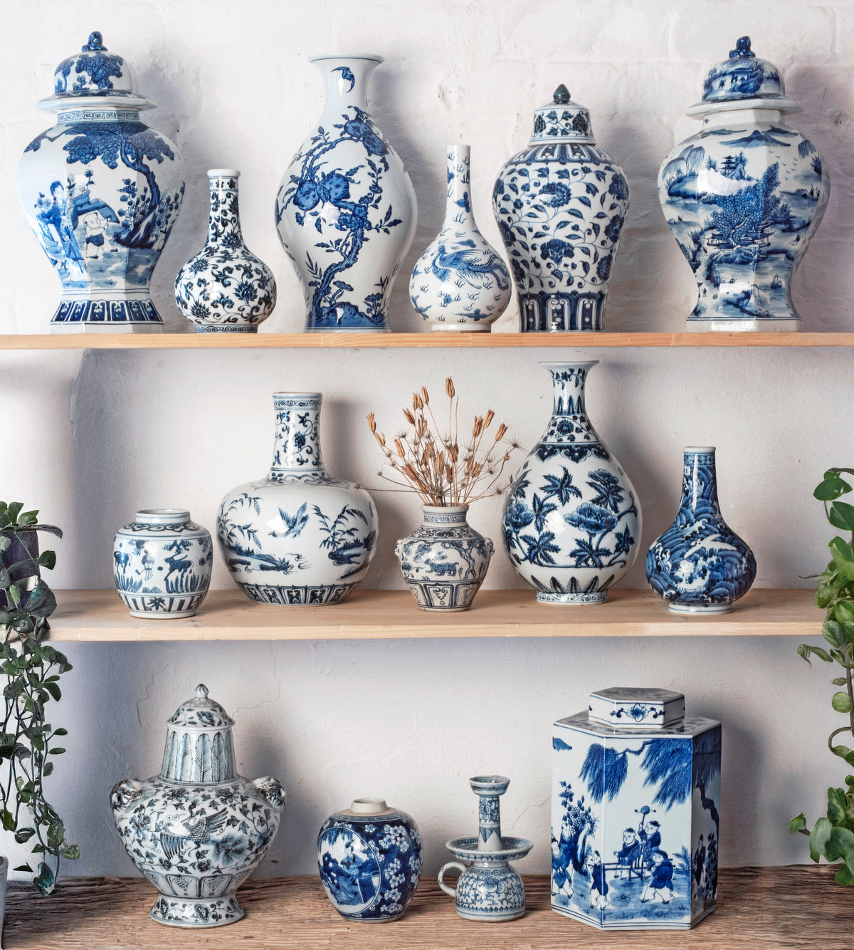 Chinese blue & white porcelain vases on a shelf