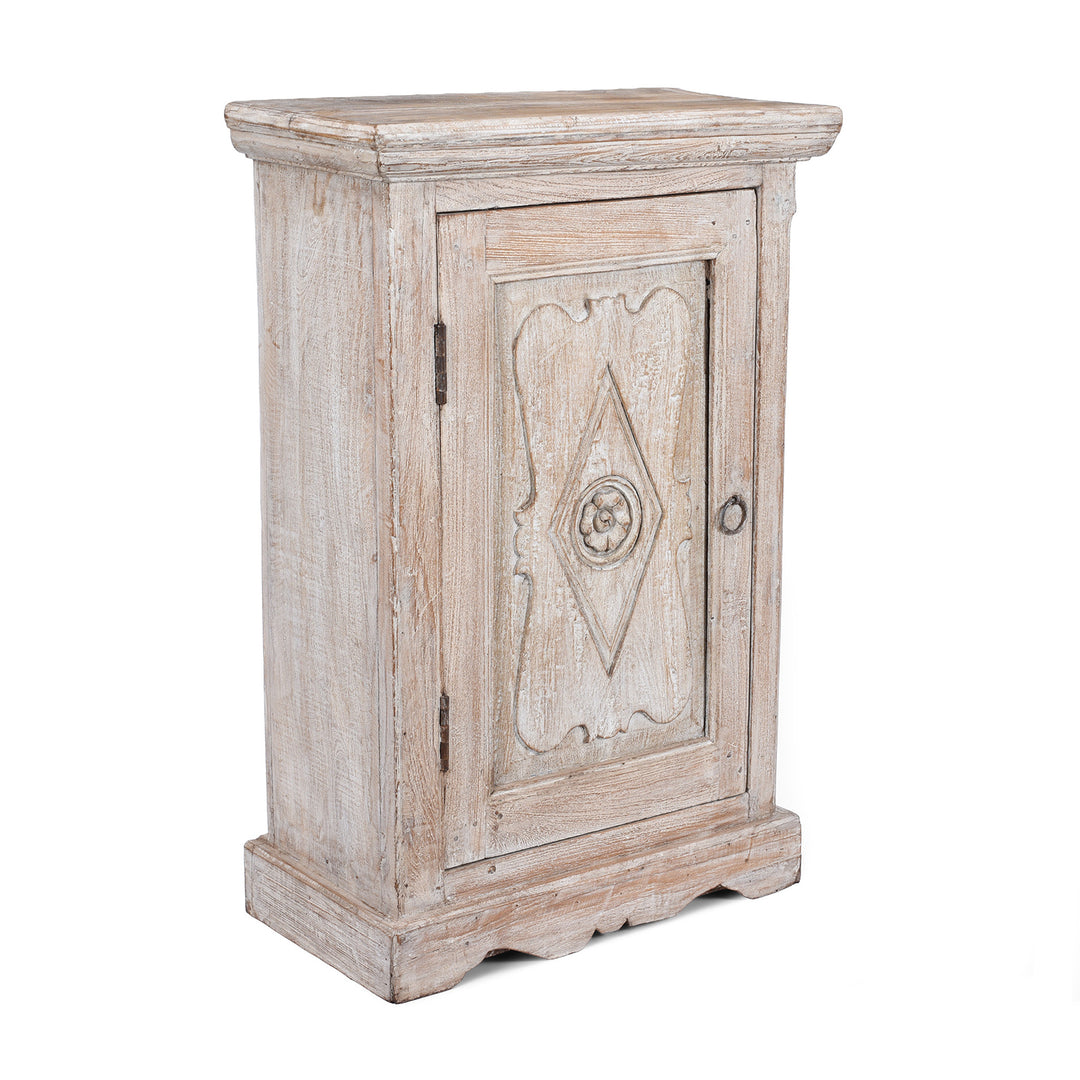 Angled View Of Indian Reclaimed Teak Bedside Cabinet With Carved Door Panel