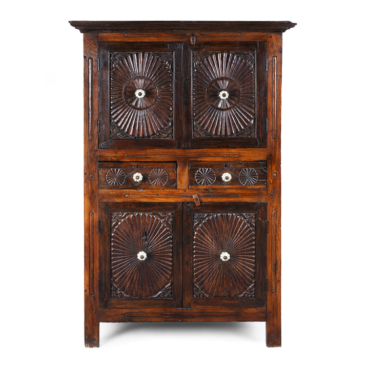 Indian Teak Almirah Cabinet With Hand-Carved Sunburst Panels, Two Drawers And White Ceramic Handles