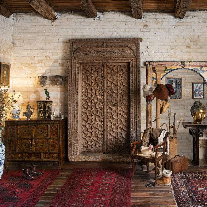 Indian interior with a grandiose antique haveli door