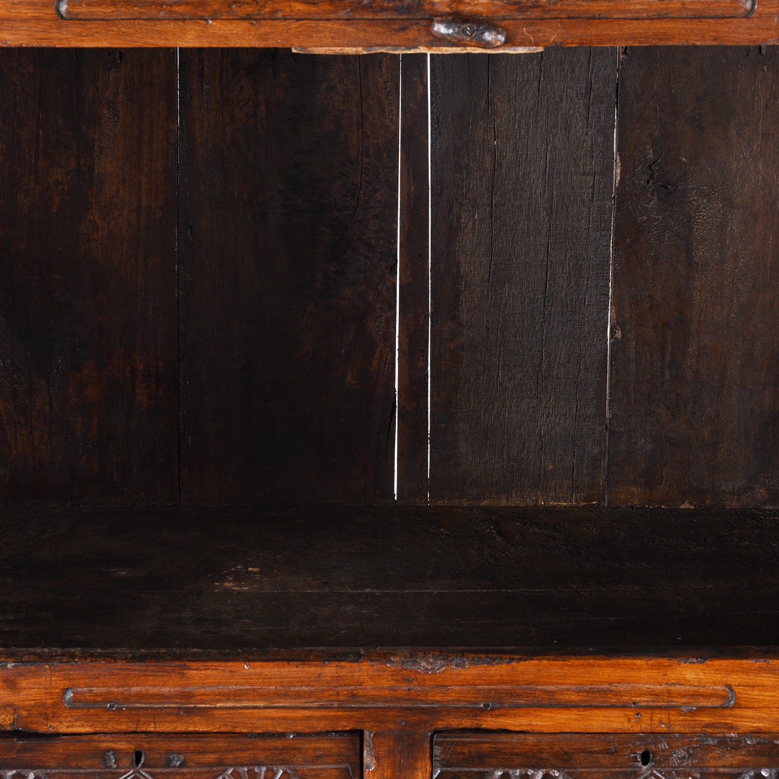 Shelf Detail From Indian Teak Almirah Cabinet With Hand-Carved Sunburst Panels, Two Drawers And White Ceramic Handles