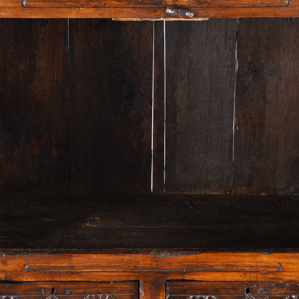 Shelf Detail From Indian Teak Almirah Cabinet With Hand-Carved Sunburst Panels, Two Drawers And White Ceramic Handles